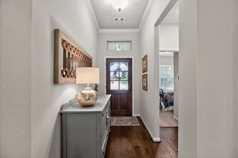a room with furniture and wooden floor