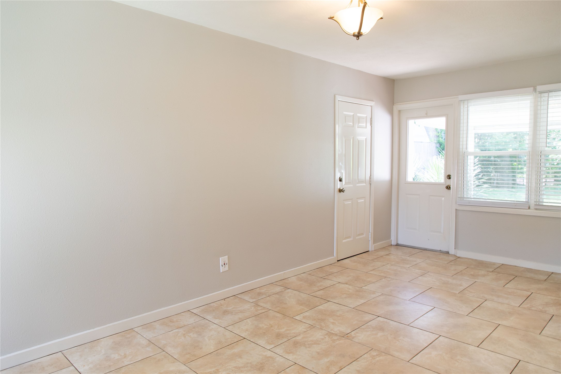 3314 Rochdale Street Houston, TX 77025 - Photo 12 of 29 a view of an empty room with window