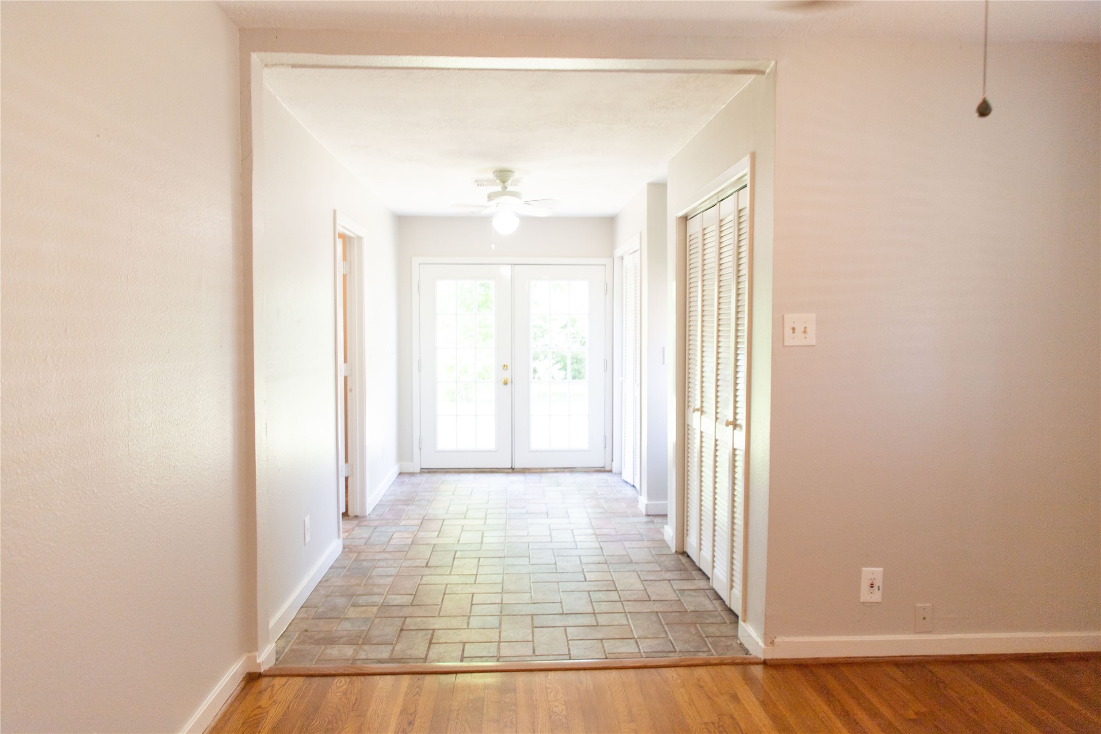 3314 Rochdale Street Houston, TX 77025 - Photo 15 of 29 a view of a hallway with wooden floor