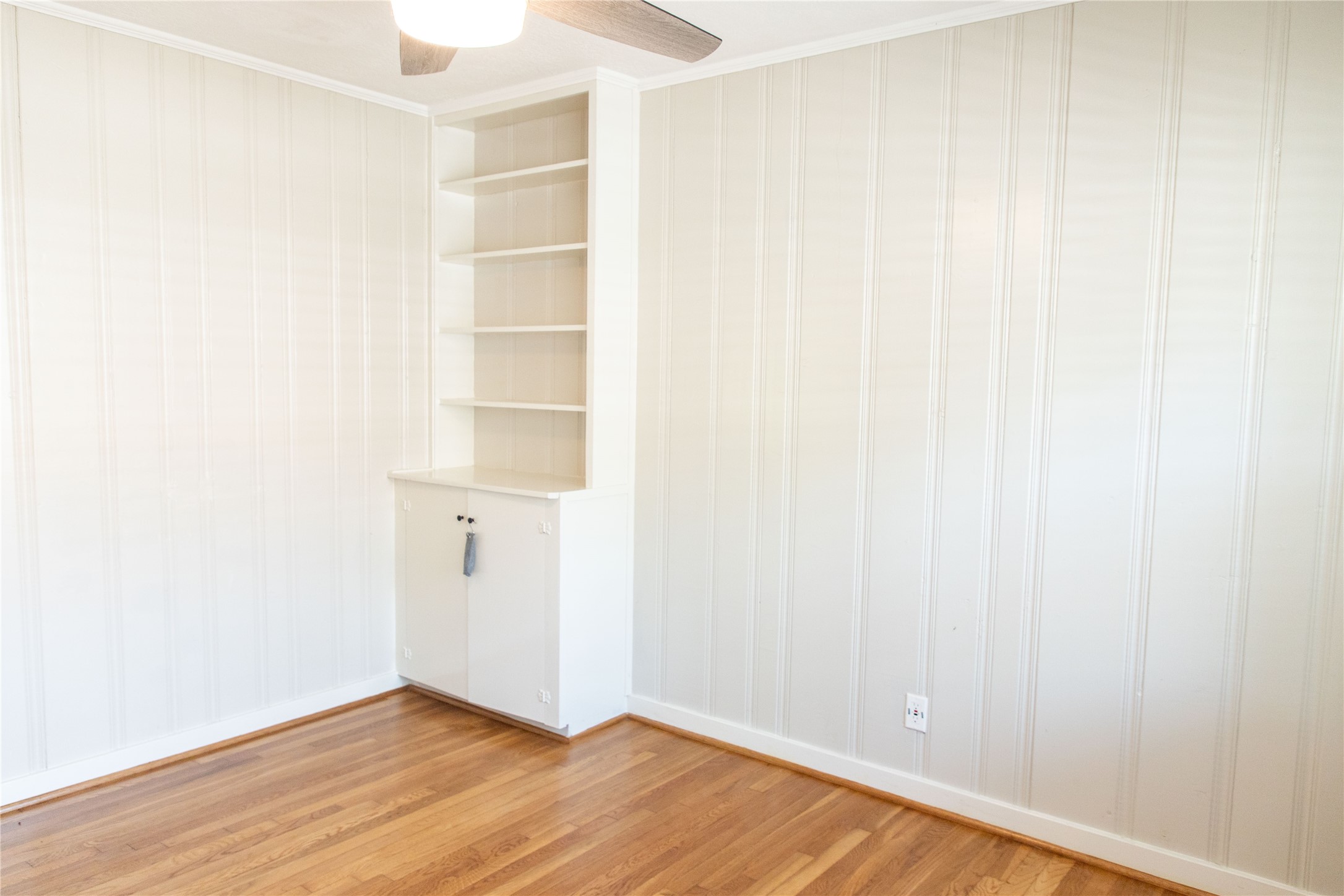 3314 Rochdale Street Houston, TX 77025 - Photo 20 of 29 a view of an empty room with wooden floor