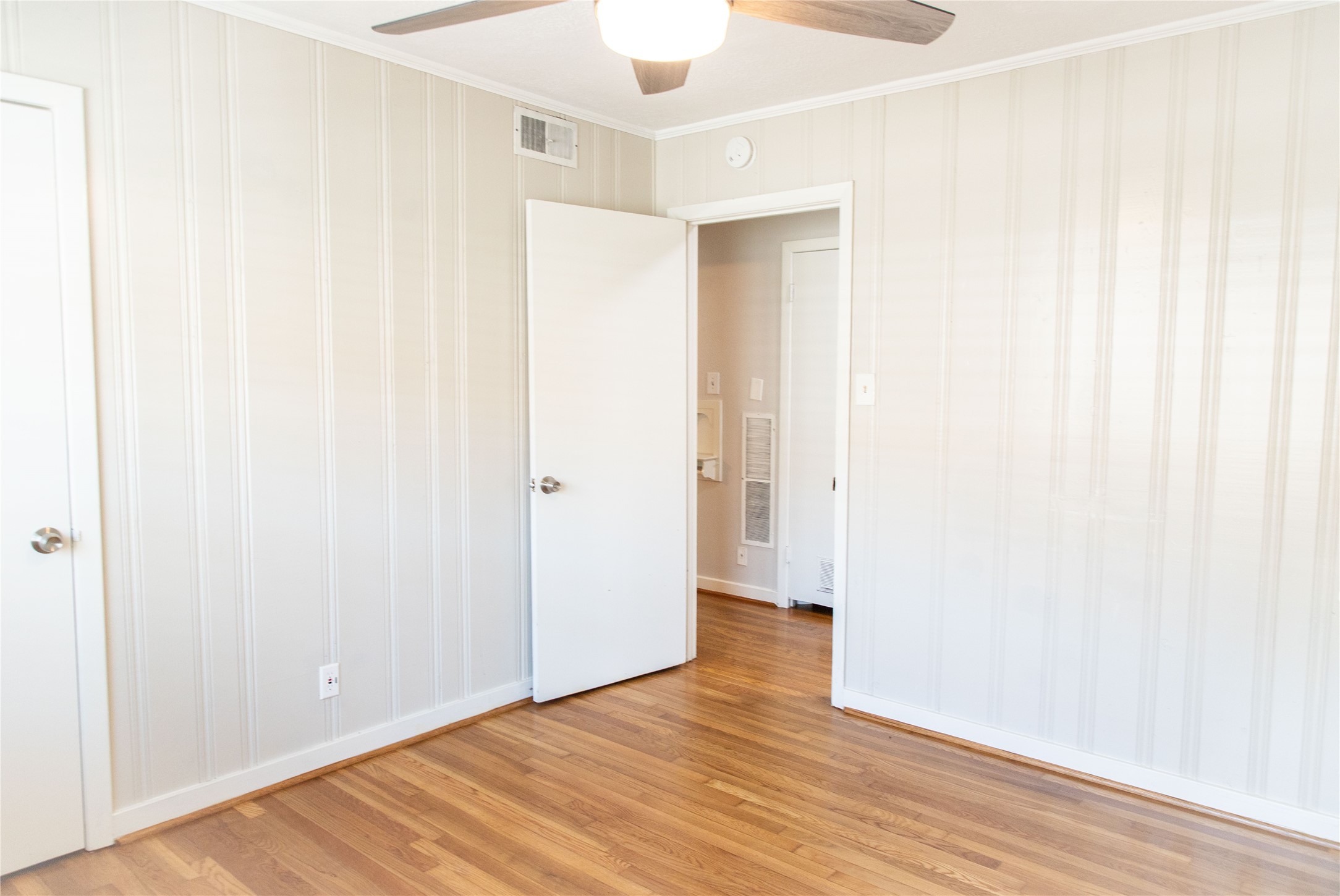 3314 Rochdale Street Houston, TX 77025 - Photo 21 of 29 a view of an empty room with wooden floor
