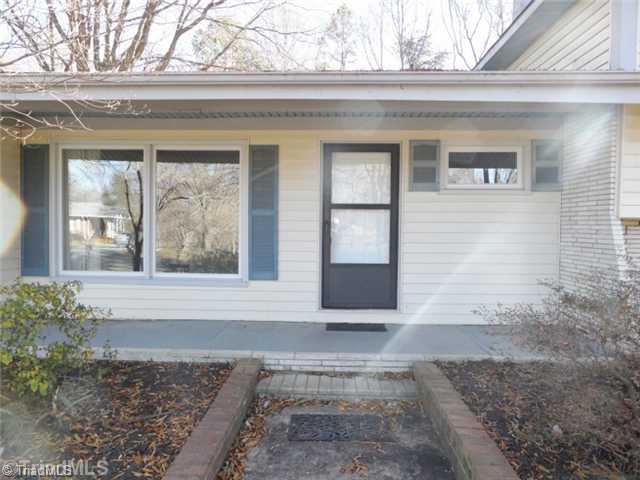 6804 Ivy Lane Oak Ridge, NC 27310 - Photo 2 of 16 Exterior Front. What a cute covered front porch to greet you and your guests. Add rocking chairs and you re all set!