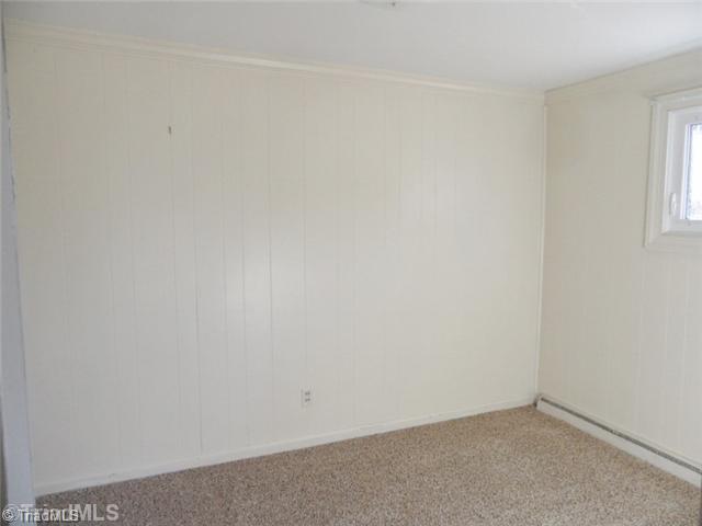 6804 Ivy Lane Oak Ridge, NC 27310 - Photo 11 of 16 Master Bedroom. The master bedroom is upstairs and has brand new carpeting and neutral paint.