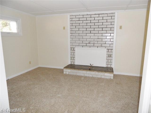 6804 Ivy Lane Oak Ridge, NC 27310 - Photo 6 of 16 Den/Family/Great Room. The Den is off of the living room and gives you additional space to spread out: Den, playroom, office...its up to you!