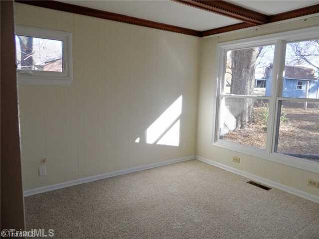 6804 Ivy Lane Oak Ridge, NC 27310 - Photo 7 of 16 Executive Office/Suite. The home office is just off of the kitchen...could even make an overflow bedroom if needed (no closet).