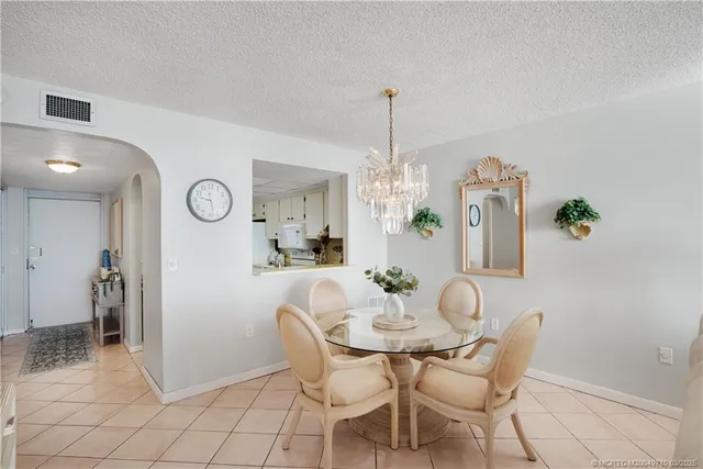 a bathroom with a sink mirror and toilet