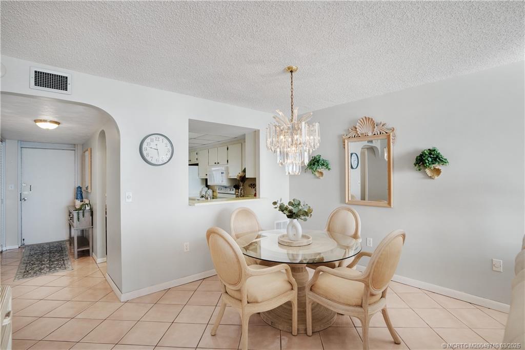 3200 North Hwy A1A, Unit 805 Fort Pierce, FL 34949 - Photo 15 of 43 a view of a dining room with furniture