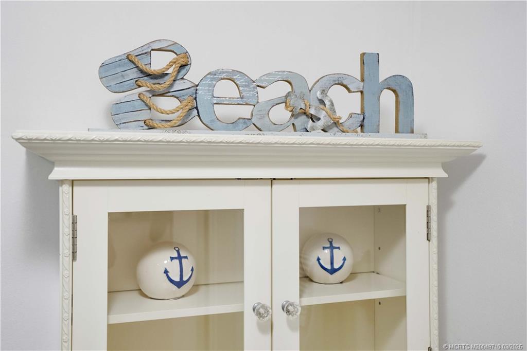 3200 North Hwy A1A, Unit 805 Fort Pierce, FL 34949 - Photo 18 of 43 a close view of a stove and cabinets