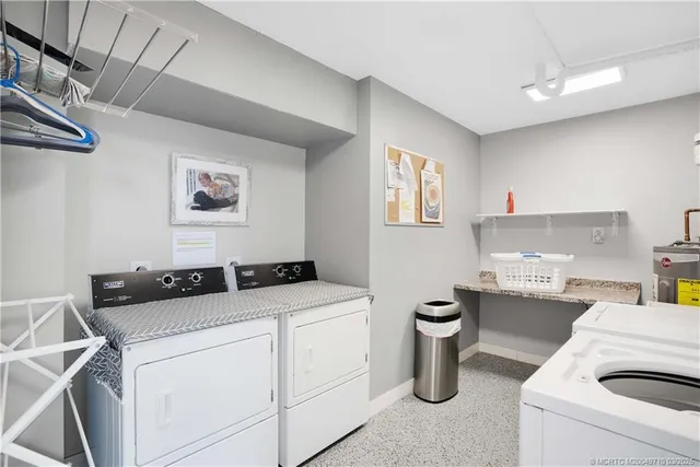 a view of a chair and tables front of the house