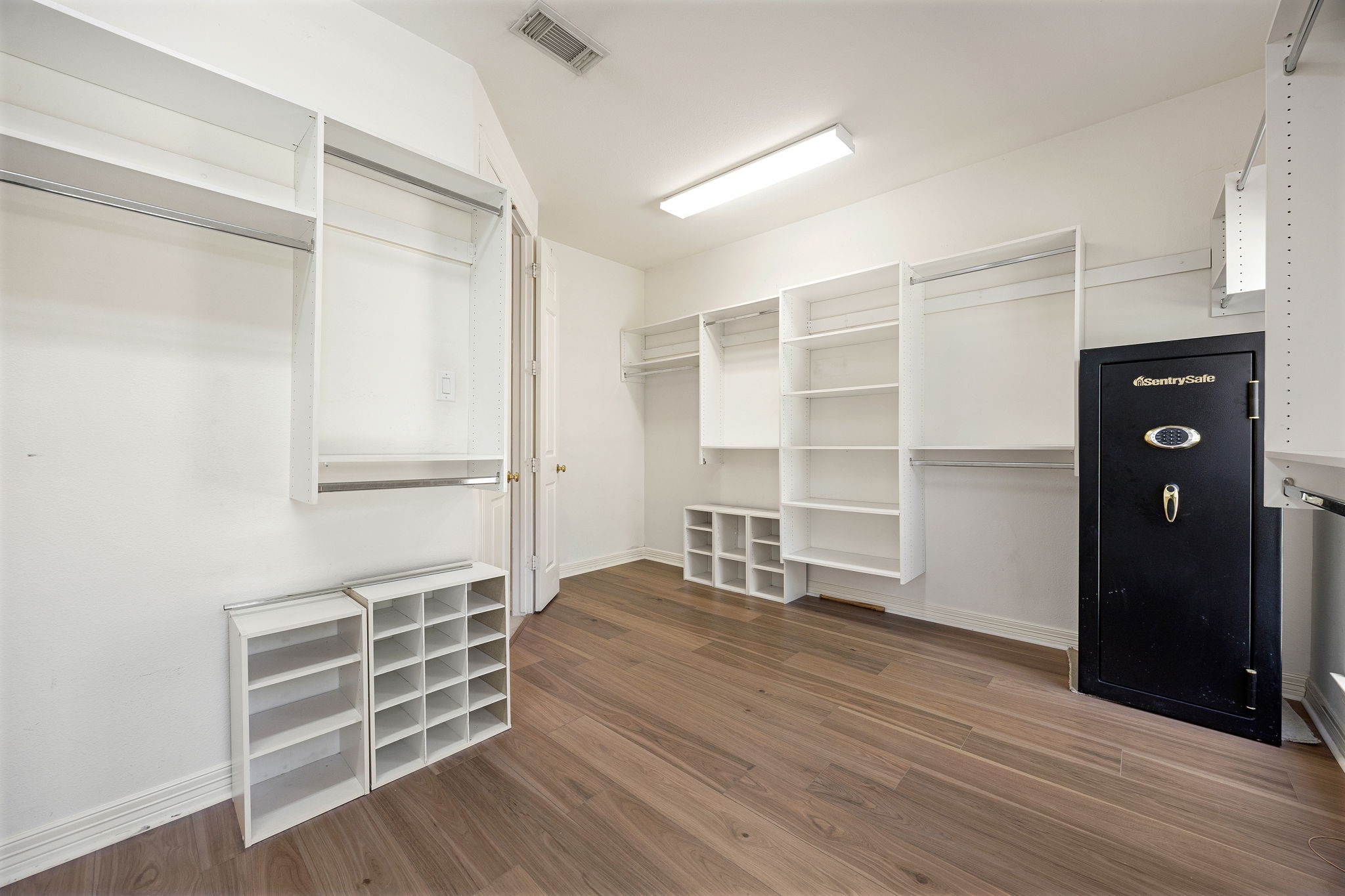 14419 Timbergreen Drive Magnolia, TX 77355 - Photo 16 of 43 Spacious walk-in closet featuring built-in shelves, multiple hanging areas, and plenty of room for storage and organization.