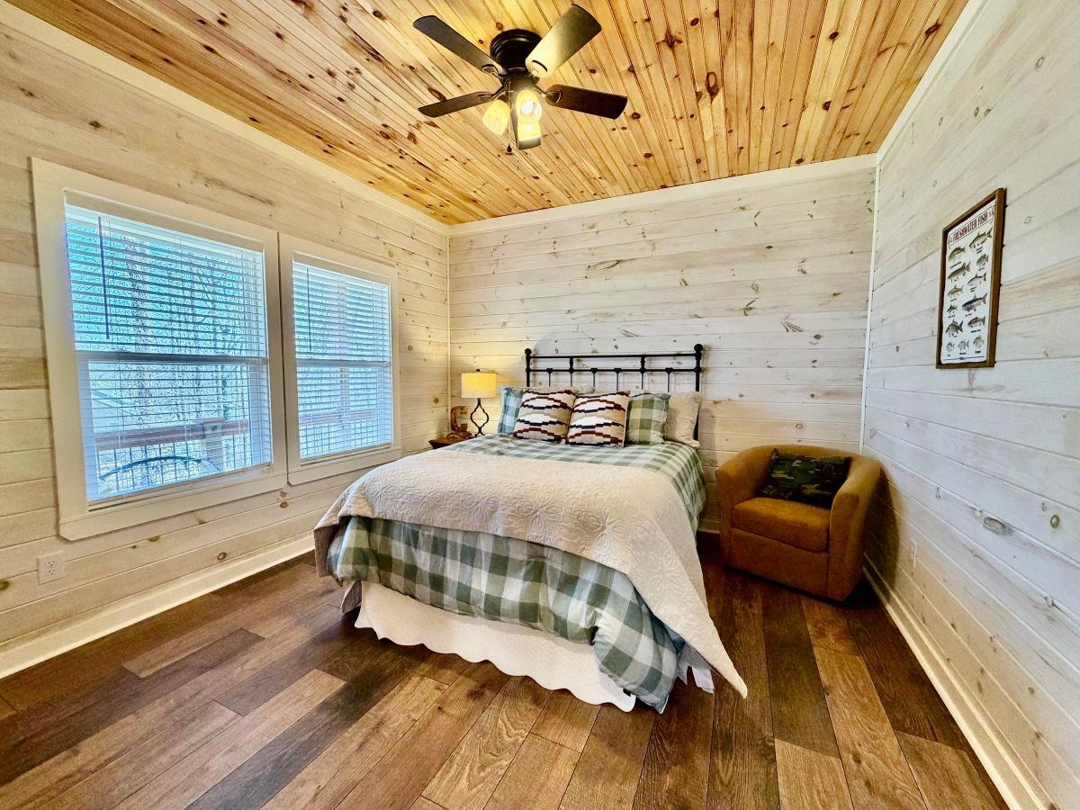 540 Muscatel Lane Counce, TN 38326 - Photo 10 of 29 a bedroom with a bed and a chair