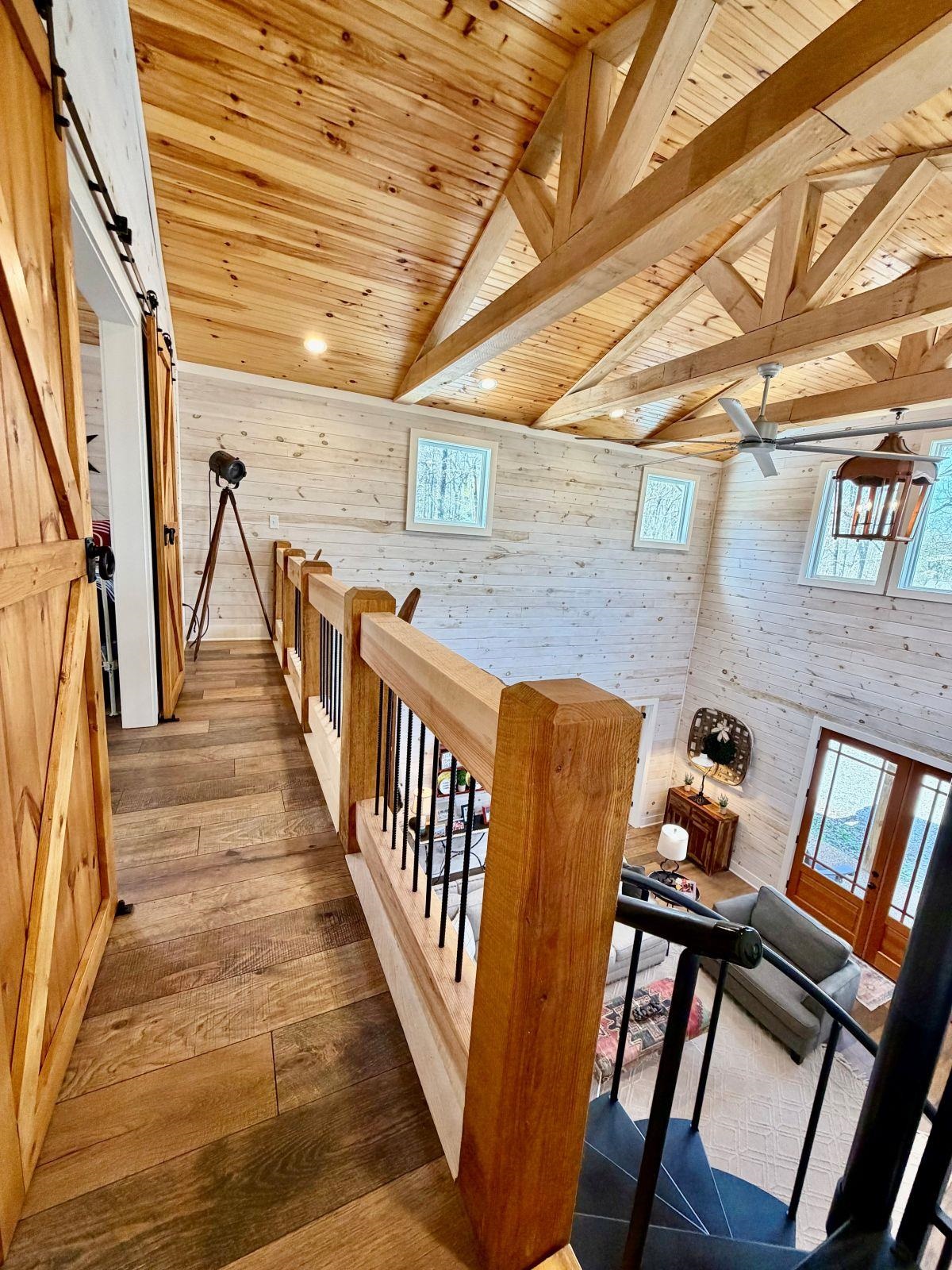 540 Muscatel Lane Counce, TN 38326 - Photo 16 of 29 a view of wooden stairs and windows in a room