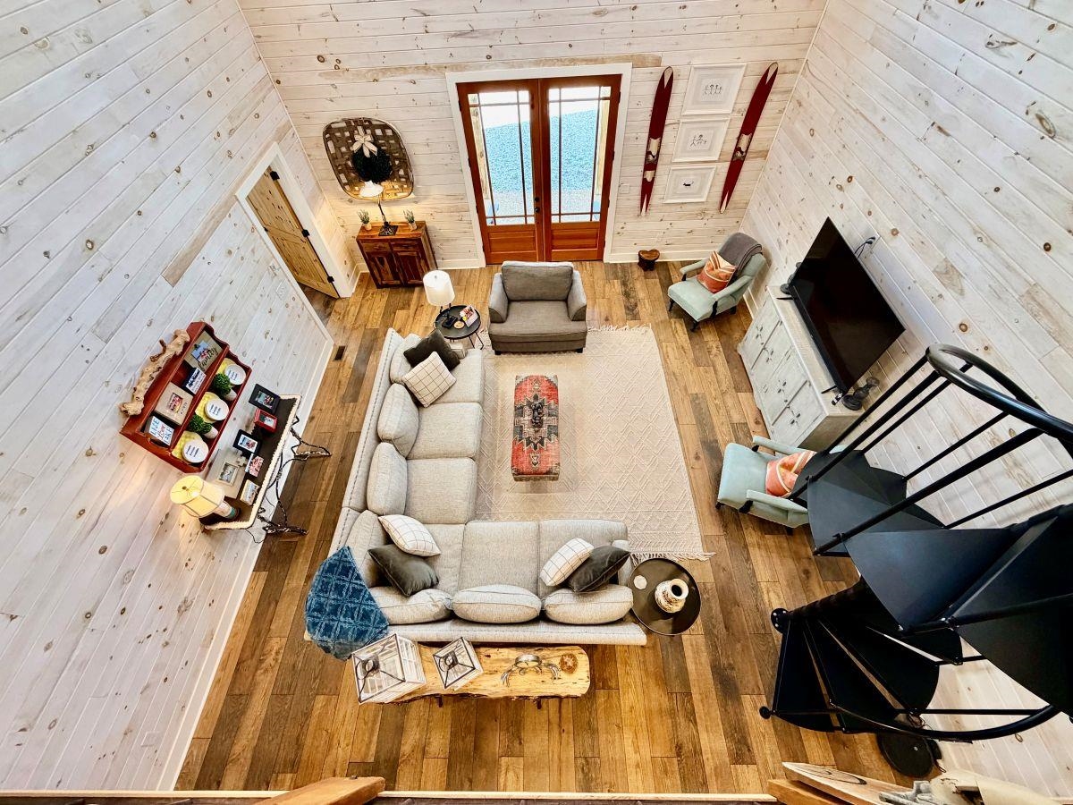 540 Muscatel Lane Counce, TN 38326 - Photo 22 of 29 a picture of a living room with furniture and a floor to ceiling window