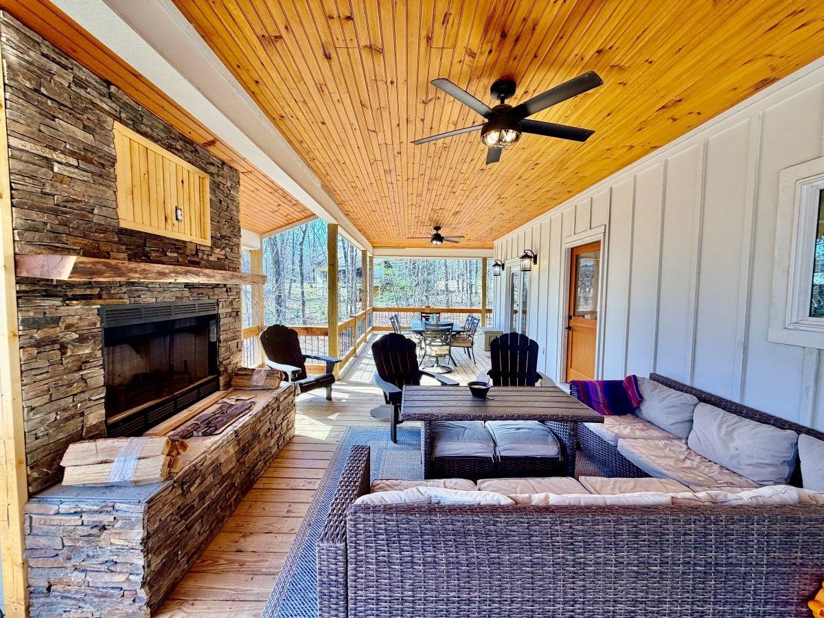 540 Muscatel Lane Counce, TN 38326 - Photo 23 of 29 a living room with furniture ceiling fan and a fireplace