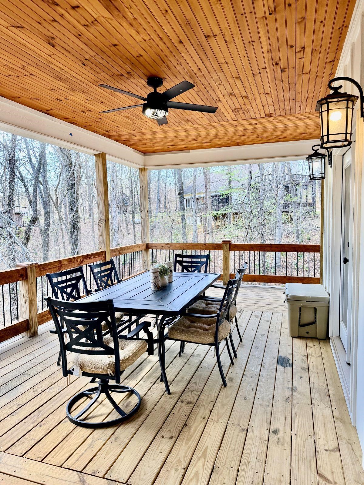 540 Muscatel Lane Counce, TN 38326 - Photo 25 of 29 a view of a roof deck with table and chairs