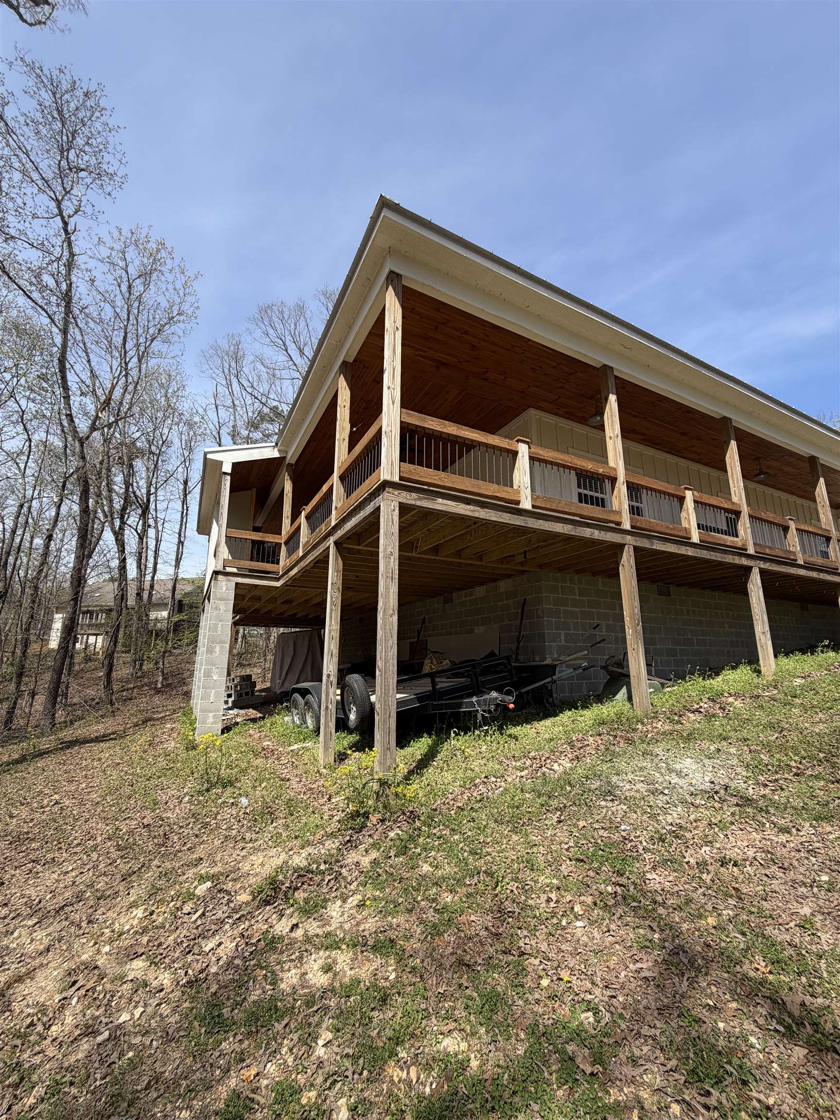540 Muscatel Lane Counce, TN 38326 - Photo 28 of 29 a view of wooden house with large windows