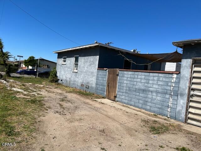 5084 Bradfield Place Oxnard, CA 93033 - Photo 12 of 12 a view of a house with a yard