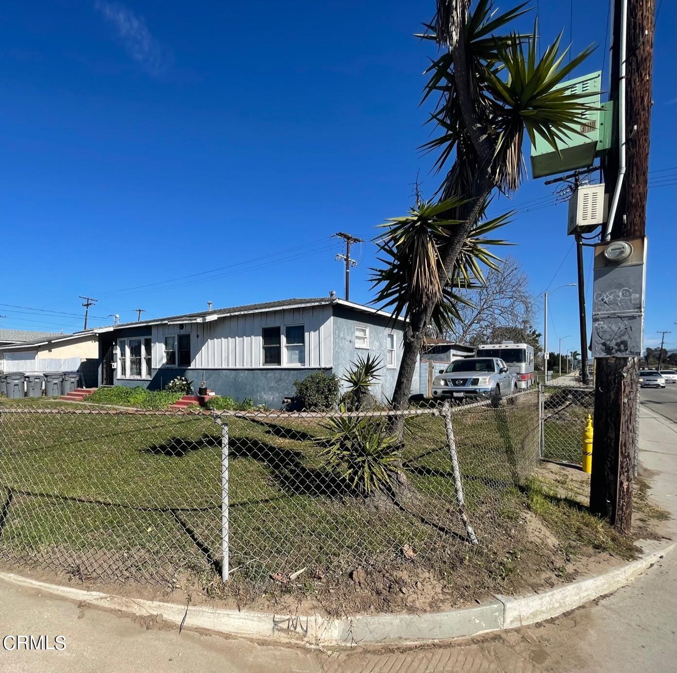 5084 Bradfield Place Oxnard, CA 93033 - Photo 2 of 12 a view of a house with backyard