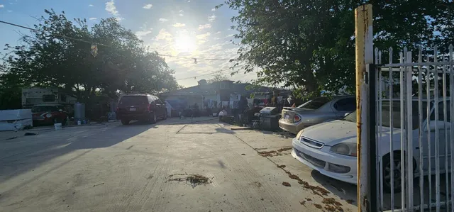 a view of a backyard of the house