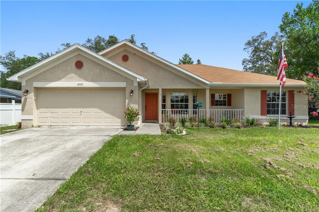 10309 Lynnhaven Road Spring Hill, FL 34608 - Photo 1 of 1 Front Elevation of home with front porch