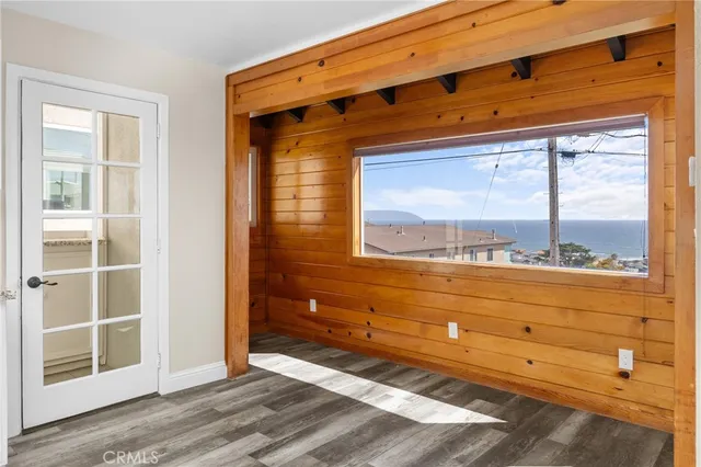 a view of a door and a window