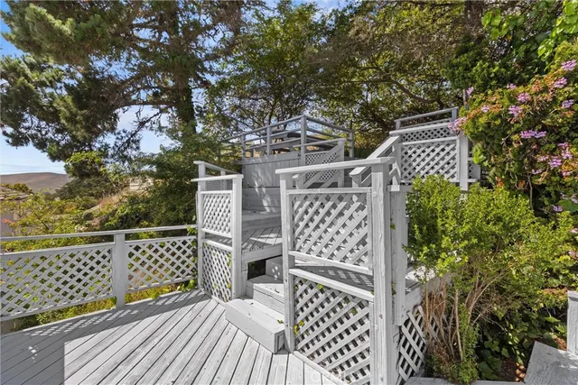 a view of balcony with wooden floor