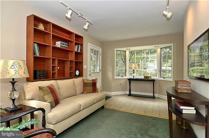 1912 Hanover Street Silver Spring, MD 20910 - Photo 14 of 29 a living room with furniture and a large window