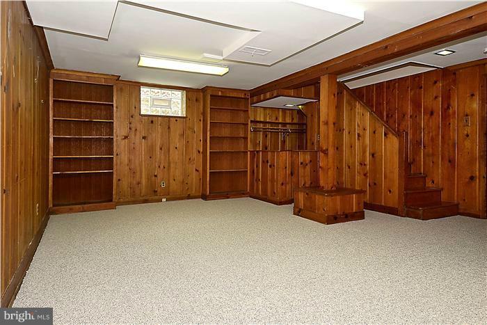 1912 Hanover Street Silver Spring, MD 20910 - Photo 3 of 29 a view of an empty room with furniture and entryway