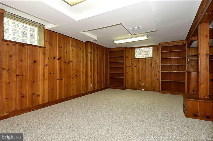 1912 Hanover Street Silver Spring, MD 20910 - Photo 6 of 29 an empty room with furniture and windows