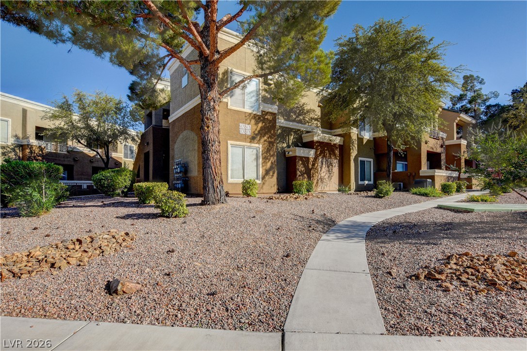 View of front of home featuring stucco siding