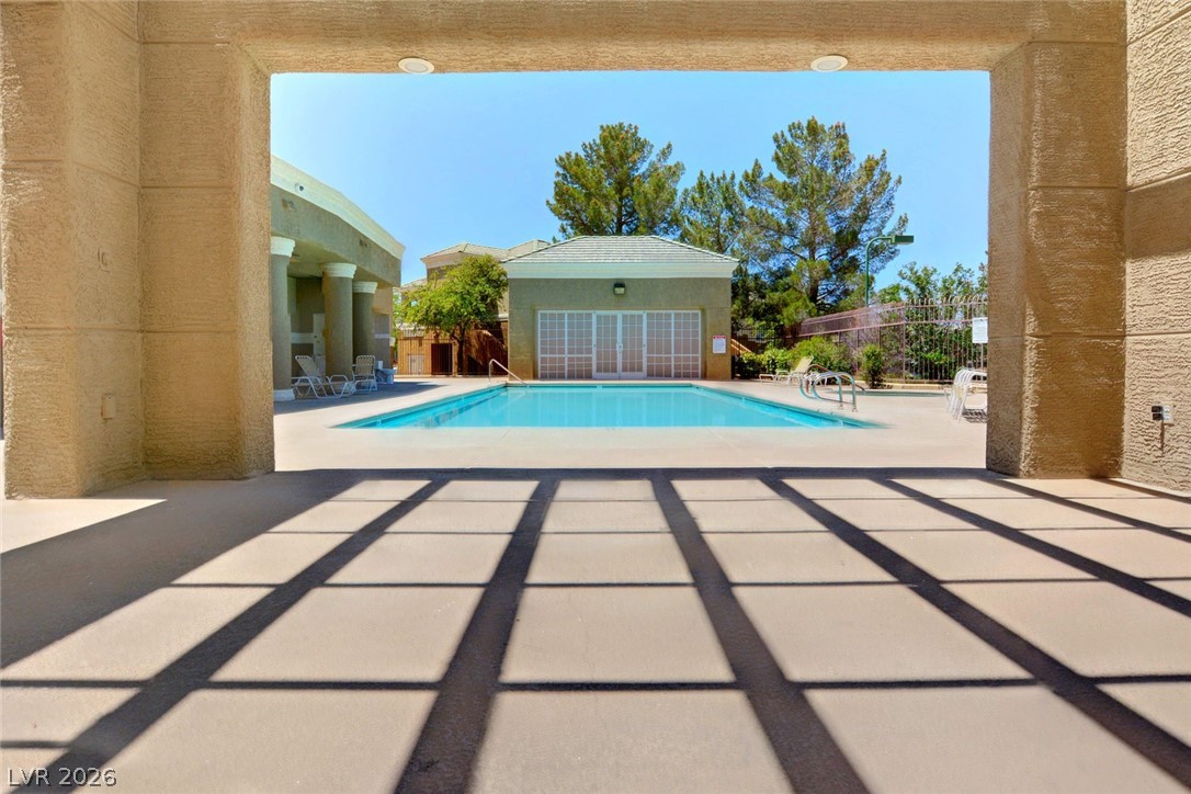 8070 West Russell Road, Unit 1064 Las Vegas, NV 89113 - Photo 28 of 35 Community pool with a patio