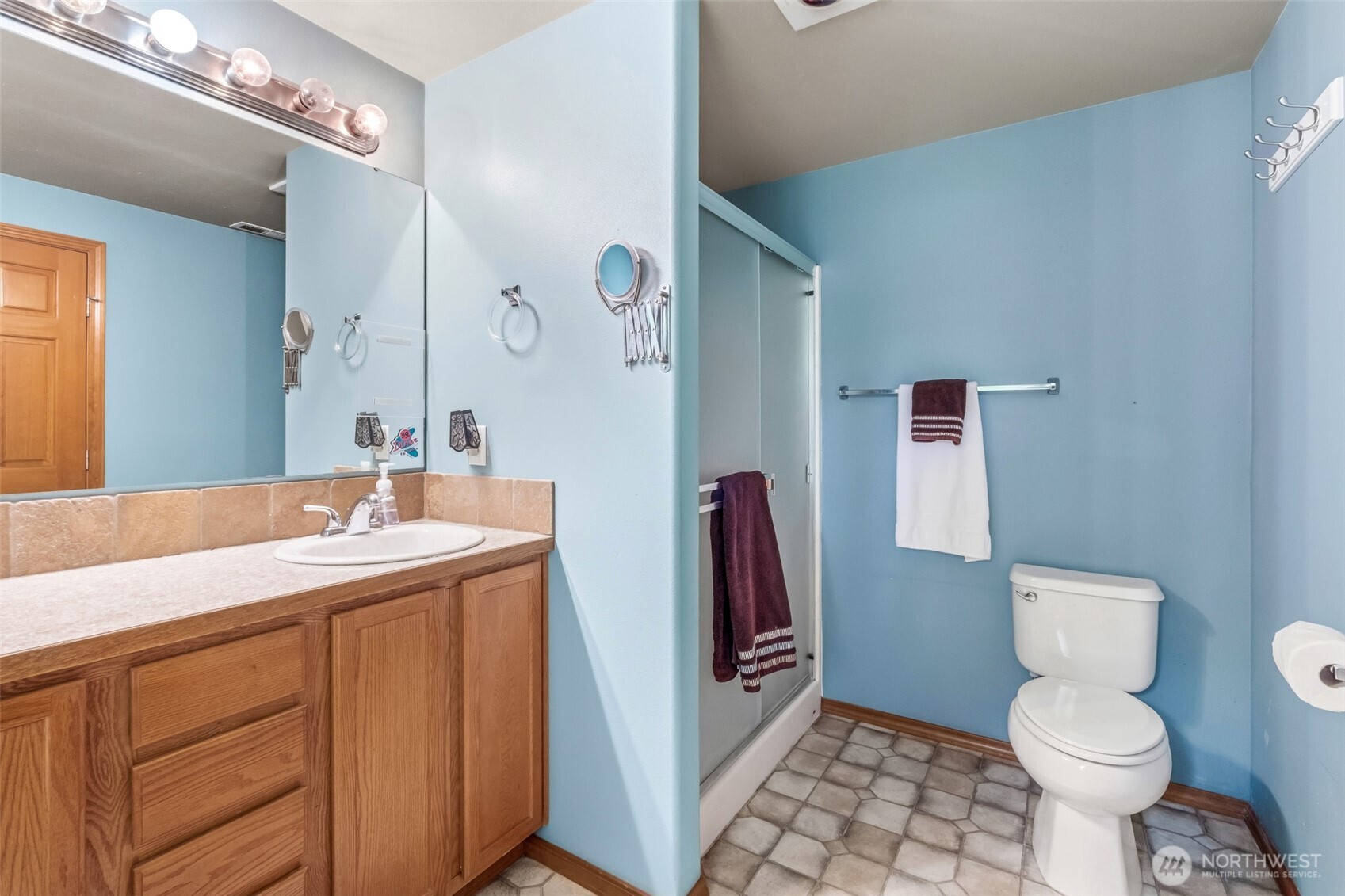 5197 Regan Road Cashmere, WA 98815 - Photo 15 of 29 a bathroom with a sink toilet and shower