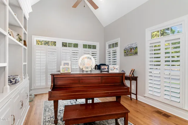 a kitchen with a stove a sink and a refrigerator