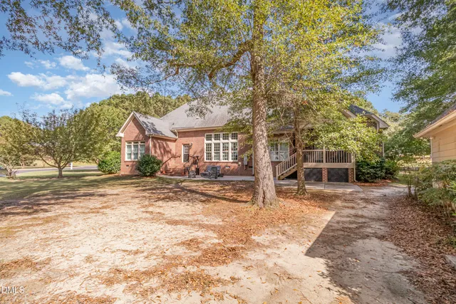 a living room with furniture and windows