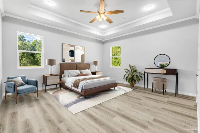 a bedroom with a bed and windows