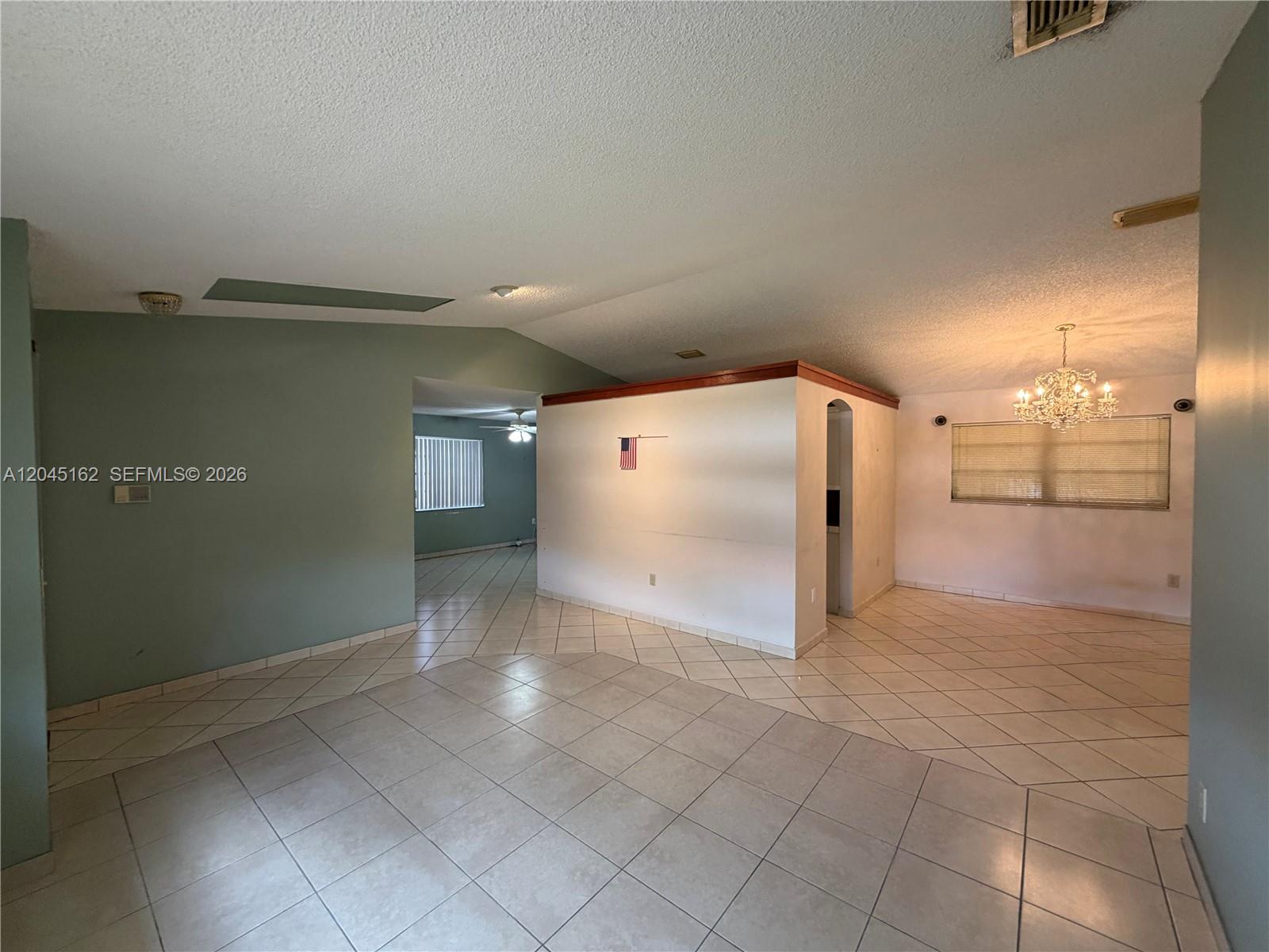 3262 Southwest 139th Place Miami, FL 33175 - Photo 4 of 36 a view of a refrigerator in a room