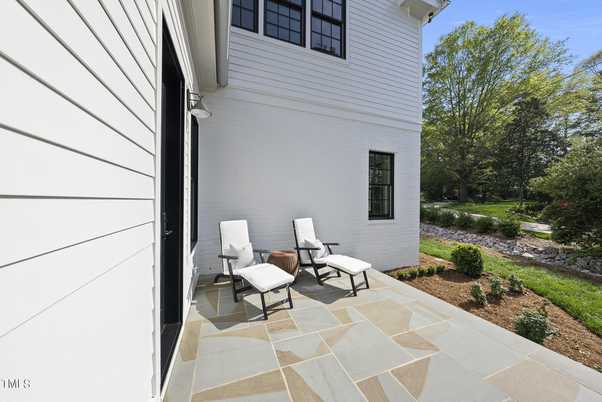3305 Founding Place Raleigh, NC 27612 - Photo 11 of 100 a couple of chairs sitting in front of a house