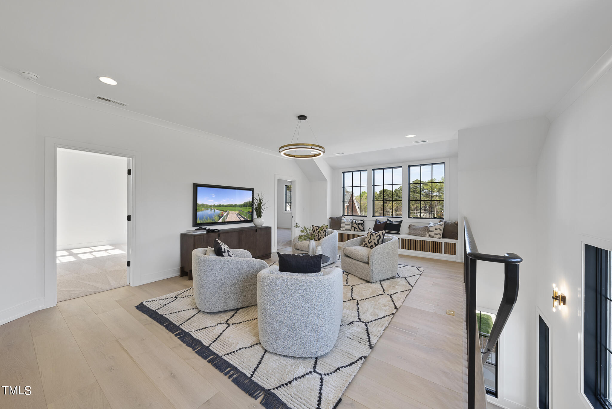3305 Founding Place Raleigh, NC 27612 - Photo 13 of 100 a living room with furniture and wooden floor