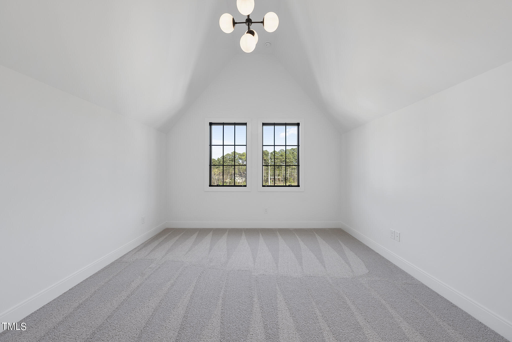 3305 Founding Place Raleigh, NC 27612 - Photo 17 of 100 wooden floor in an empty room with a window