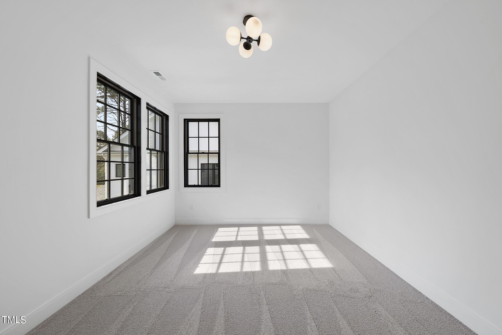 3305 Founding Place Raleigh, NC 27612 - Photo 19 of 100 an empty room with windows