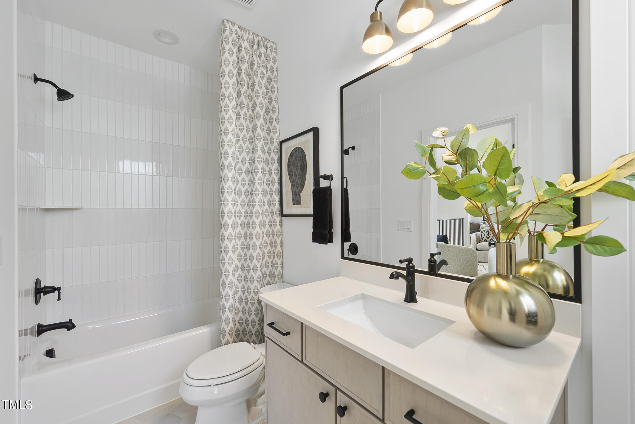 3305 Founding Place Raleigh, NC 27612 - Photo 21 of 100 a bathroom with a sink a toilet and a mirror