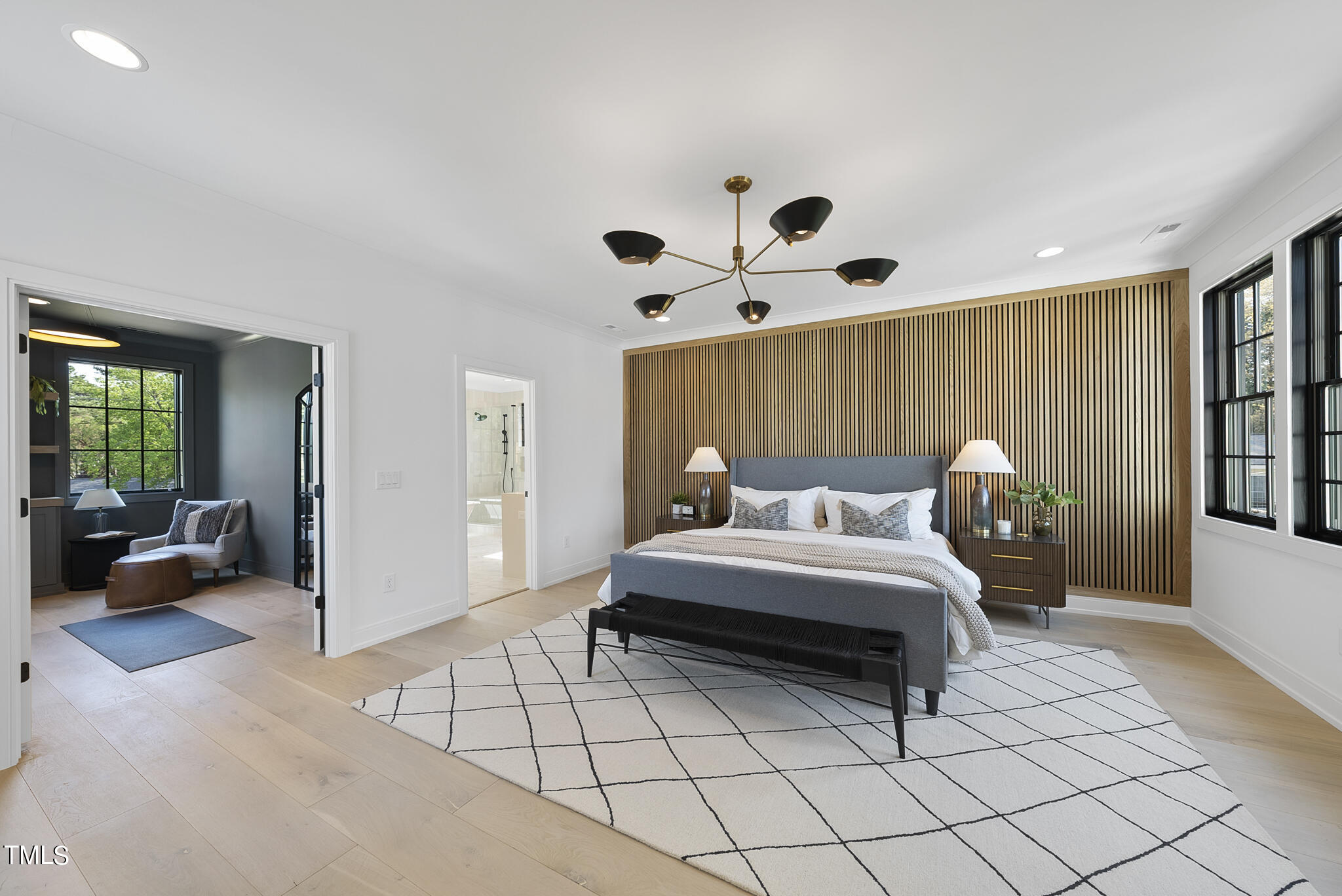 3305 Founding Place Raleigh, NC 27612 - Photo 23 of 100 a spacious bedroom with a bed and a large window