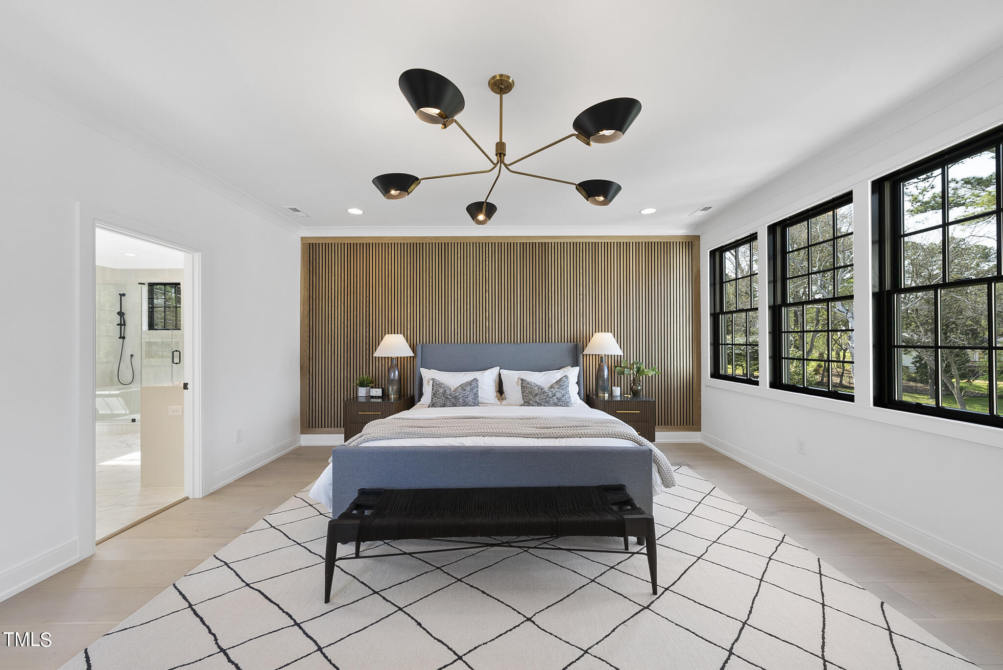 3305 Founding Place Raleigh, NC 27612 - Photo 24 of 100 a spacious bedroom with a bed and a large window