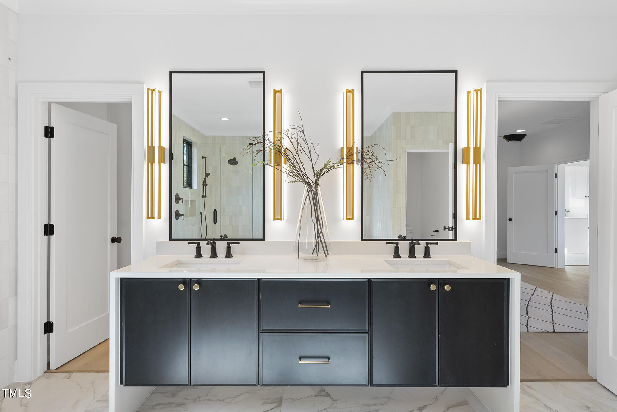 3305 Founding Place Raleigh, NC 27612 - Photo 31 of 100 a bathroom with double vanity sinks and a mirror