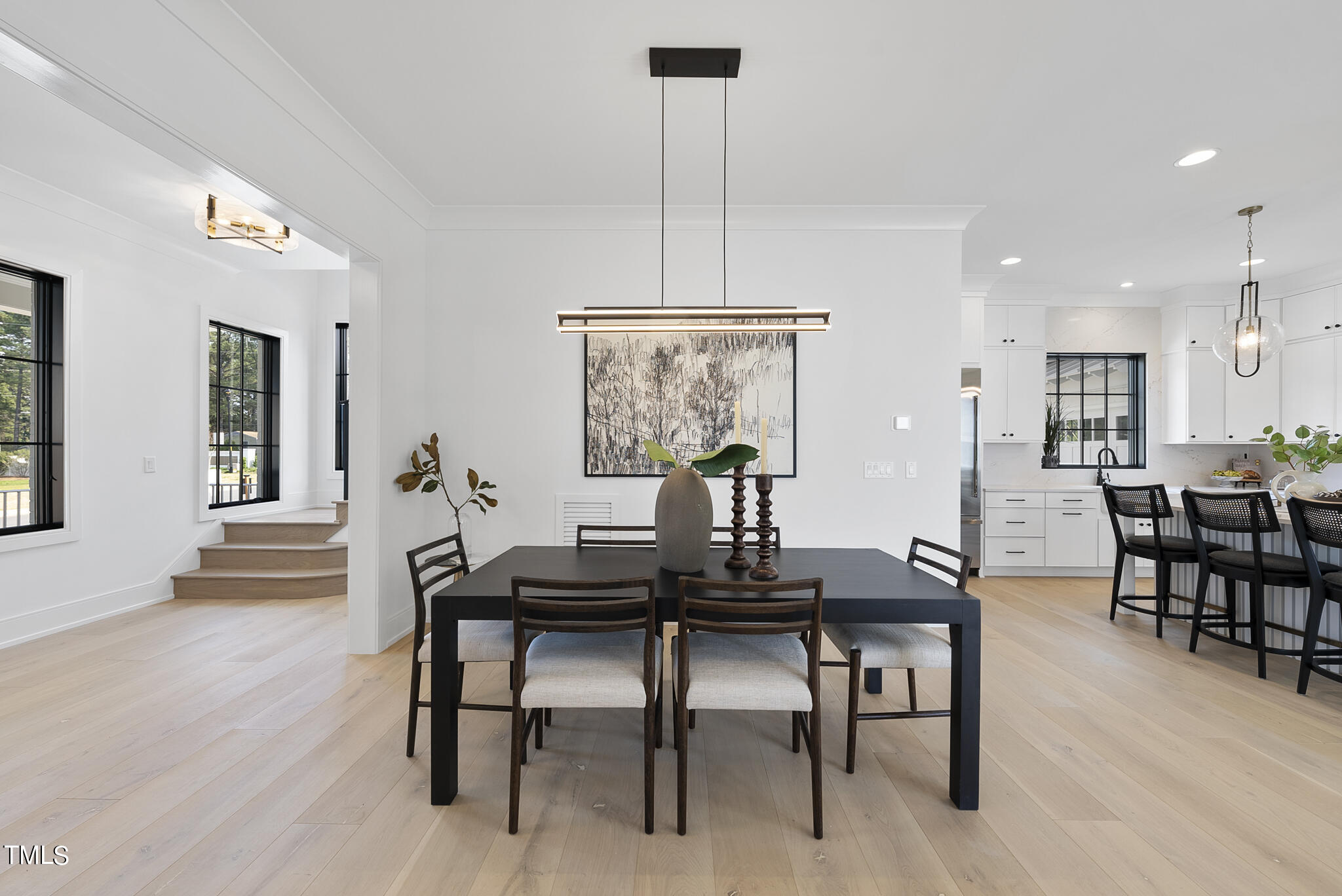 3305 Founding Place Raleigh, NC 27612 - Photo 35 of 100 a view of a dining room with furniture window and wooden floor