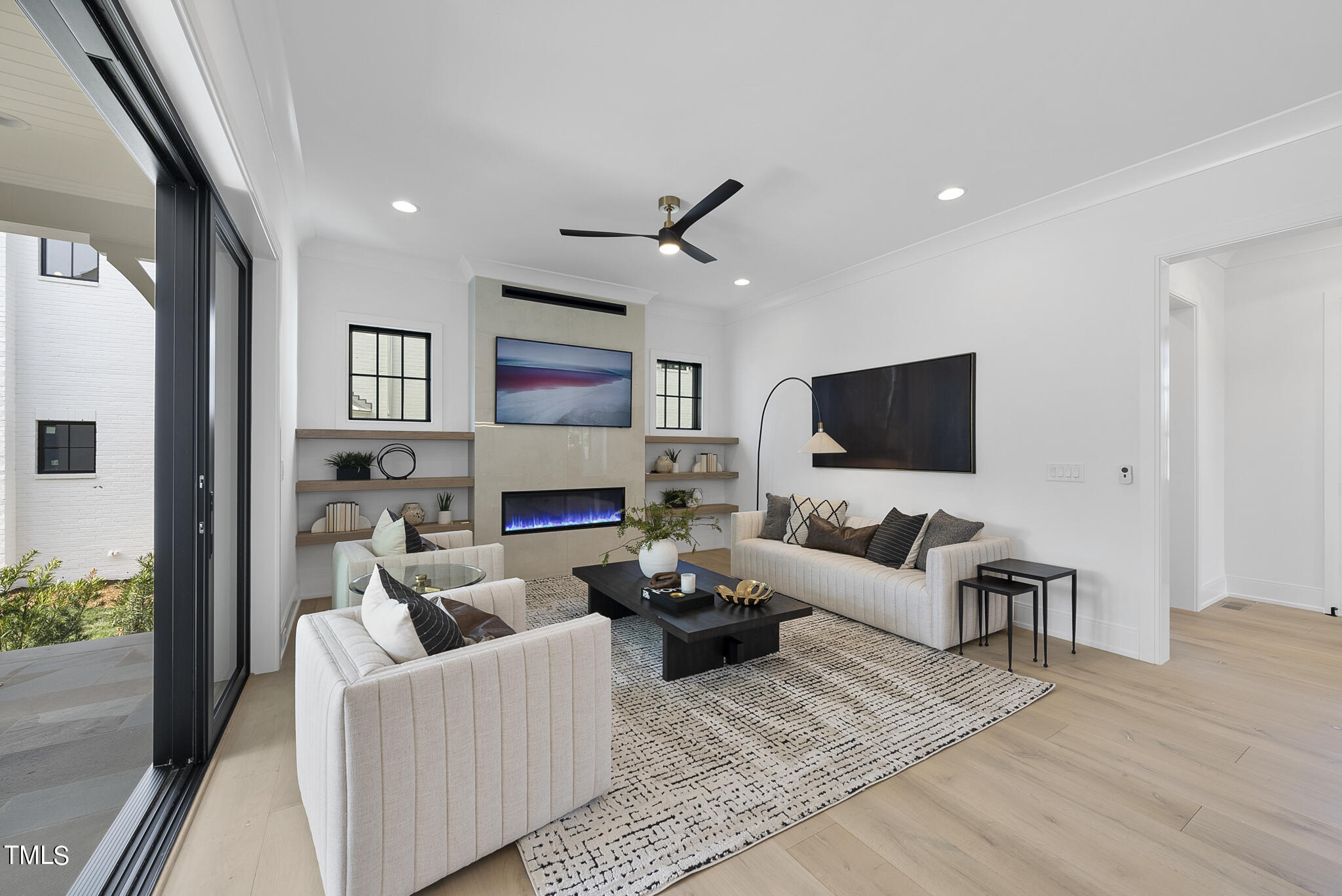 3305 Founding Place Raleigh, NC 27612 - Photo 38 of 100 a living room with furniture and a flat screen tv