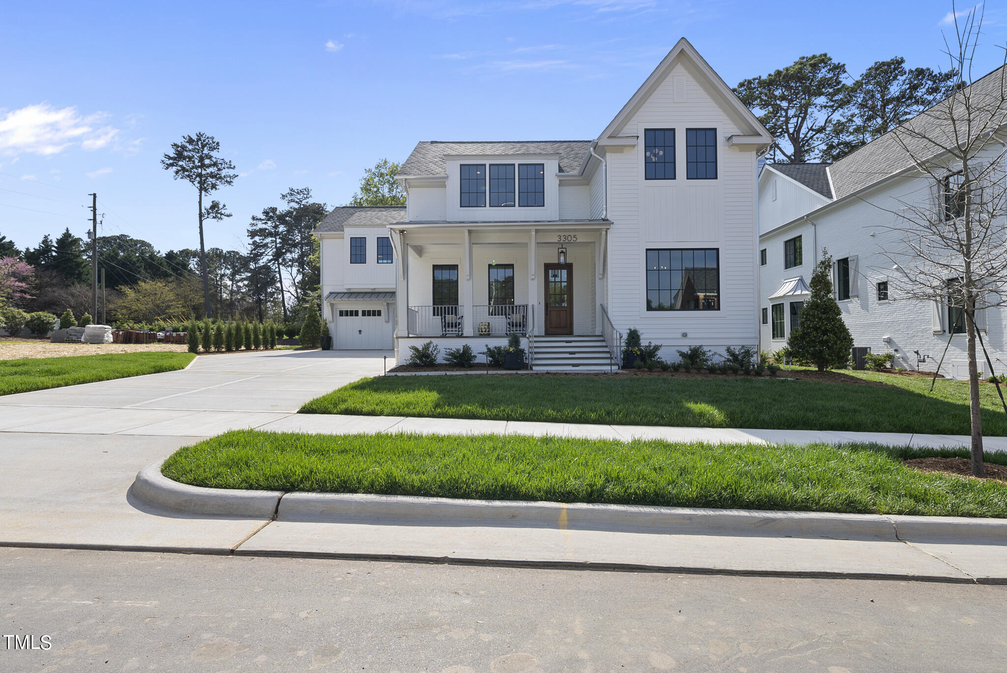 3305 Founding Place Raleigh, NC 27612 - Photo 4 of 100 a front view of house with yard and green space