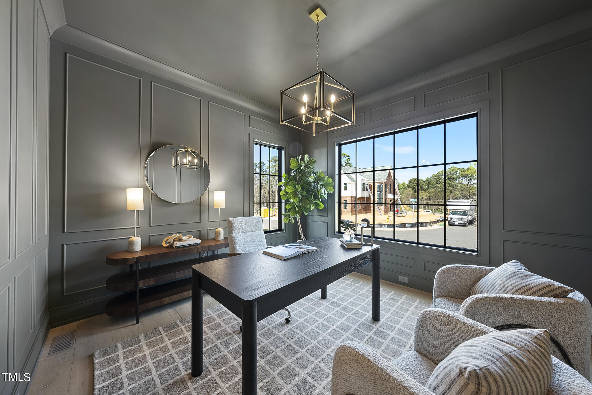 3305 Founding Place Raleigh, NC 27612 - Photo 51 of 100 a living room with furniture and a large window