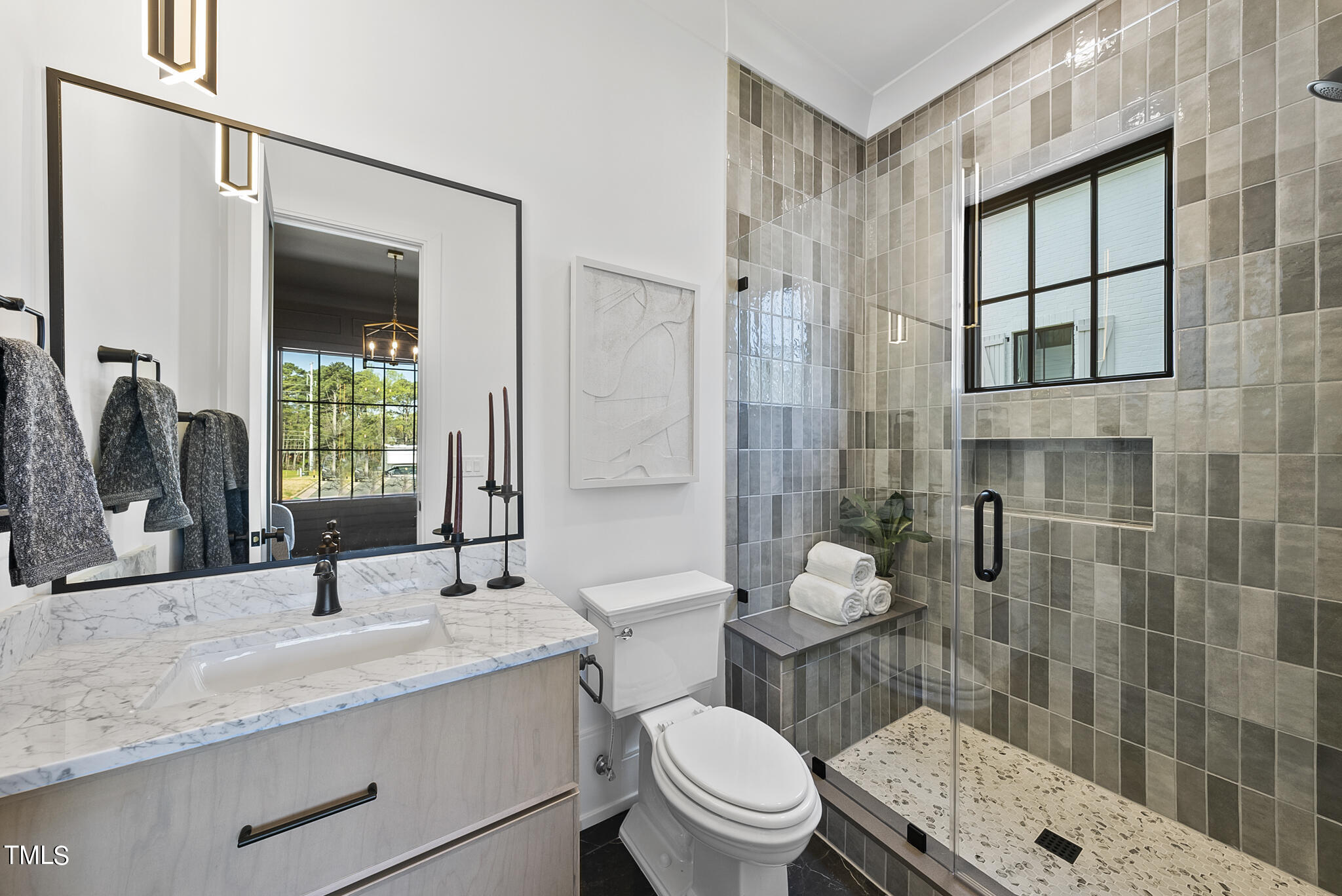 3305 Founding Place Raleigh, NC 27612 - Photo 53 of 100 a bathroom with a granite countertop sink toilet a mirror a vanity and shower
