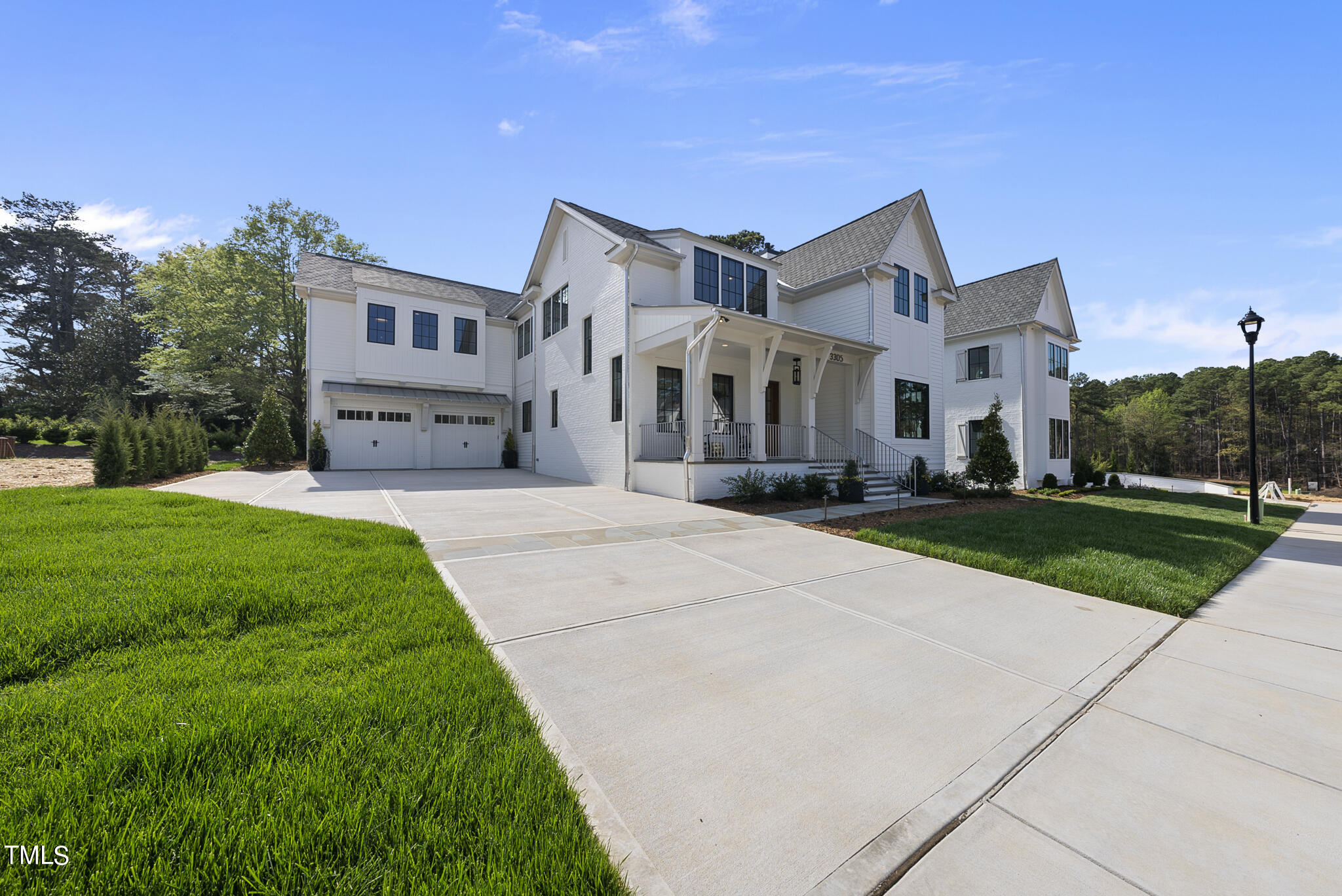 3305 Founding Place Raleigh, NC 27612 - Photo 6 of 100 a front view of a house with a yard